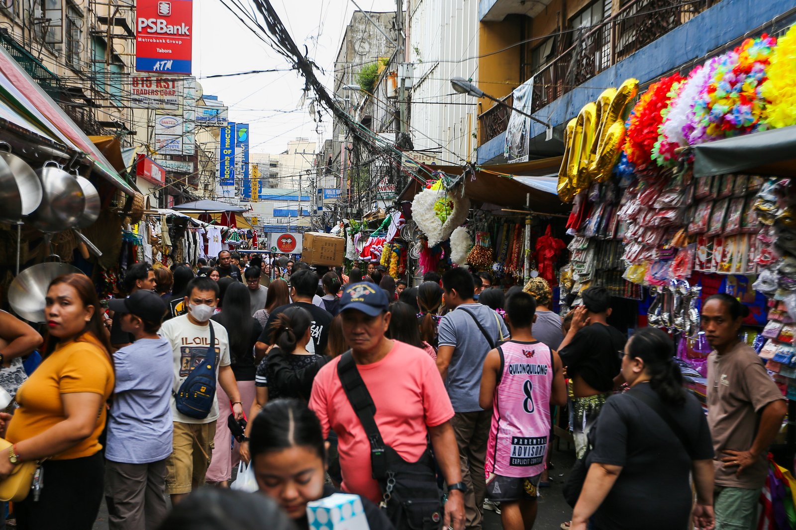 Shoppers flock to Divisoria in Manila on Sunday, 07 December 2025, as the holiday rush builds with Christmas fast approaching.