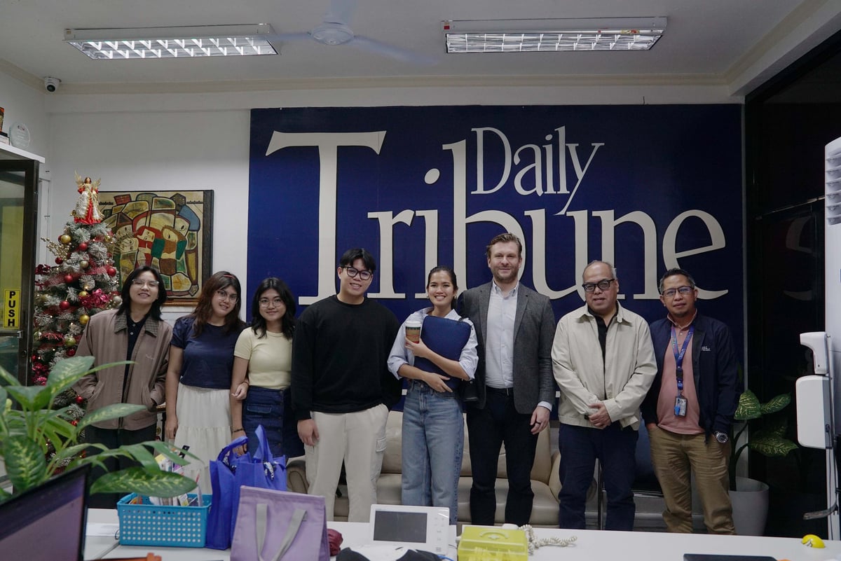 ONELOT acts as an extended family to dealership companies and its founder, Harm Julian Schumacher (third from right), became an adopted member of the Daily Tribune family.