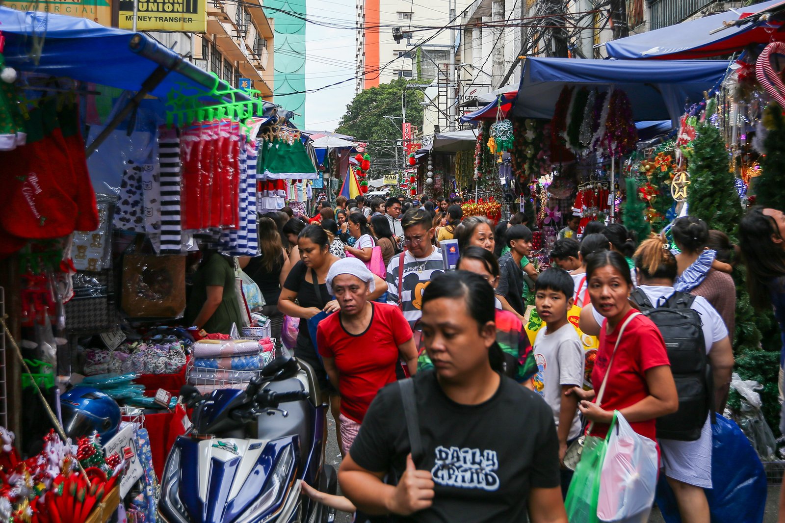 Shoppers flock to Divisoria in Manila on Sunday, 07 December 2025, as the holiday rush builds with Christmas fast approaching.