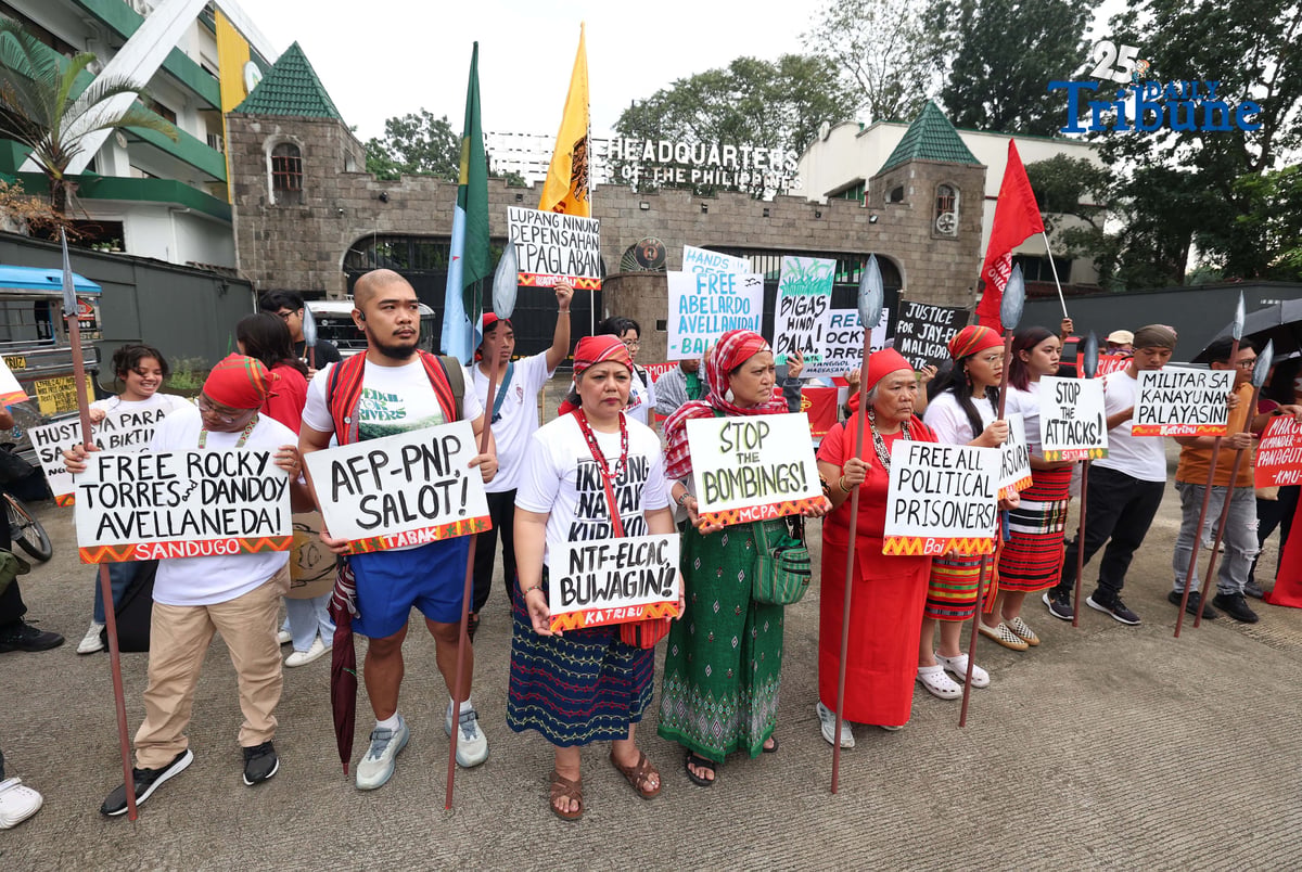 Militant and Indigenous groups stage a protest along EDSA outside Camp Aguinaldo in Quezon City on Monday, December 8, 2025, to mark Indigenous Peoples and Moro Human Rights Day. The groups called for action on alleged intensifying human rights violations, corruption scandals, and the funneling of AFP, NTF-ELCAC, and Barangay Development Program funds into militarization and CAFGU operations—amid rising reports of enforced disappearances, killings and political persecution.