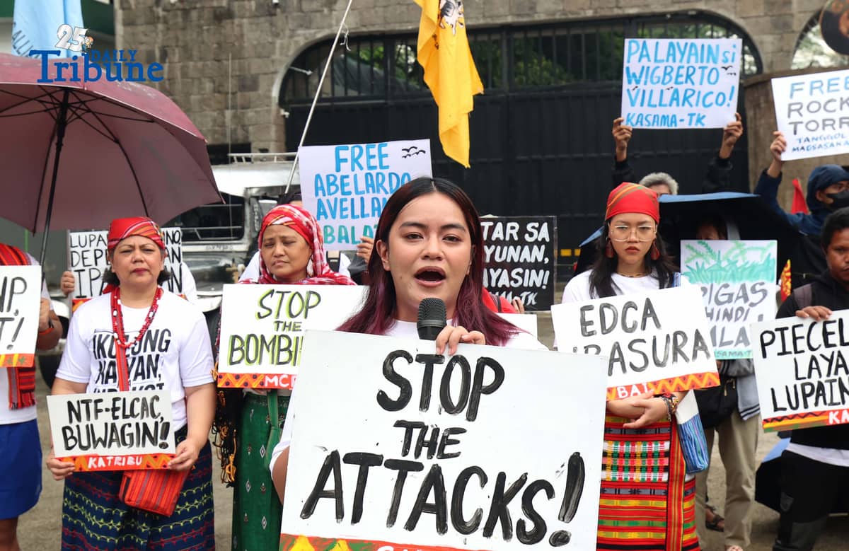 Militant and Indigenous groups stage a protest along EDSA outside Camp Aguinaldo in Quezon City on Monday, December 8, 2025, to mark Indigenous Peoples and Moro Human Rights Day. The groups called for action on alleged intensifying human rights violations, corruption scandals, and the funneling of AFP, NTF-ELCAC, and Barangay Development Program funds into militarization and CAFGU operations—amid rising reports of enforced disappearances, killings and political persecution.