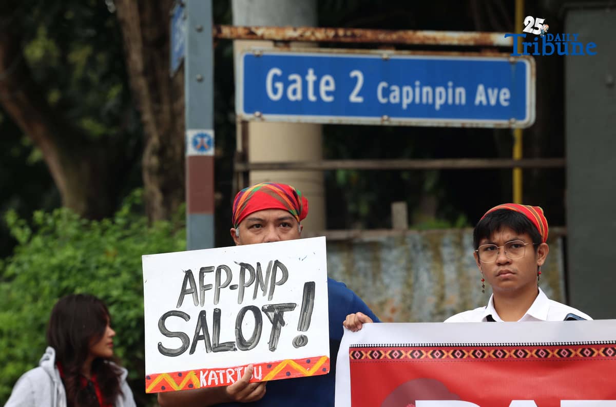 Militant and Indigenous groups stage a protest along EDSA outside Camp Aguinaldo in Quezon City on Monday, December 8, 2025, to mark Indigenous Peoples and Moro Human Rights Day. The groups called for action on alleged intensifying human rights violations, corruption scandals, and the funneling of AFP, NTF-ELCAC, and Barangay Development Program funds into militarization and CAFGU operations—amid rising reports of enforced disappearances, killings and political persecution.