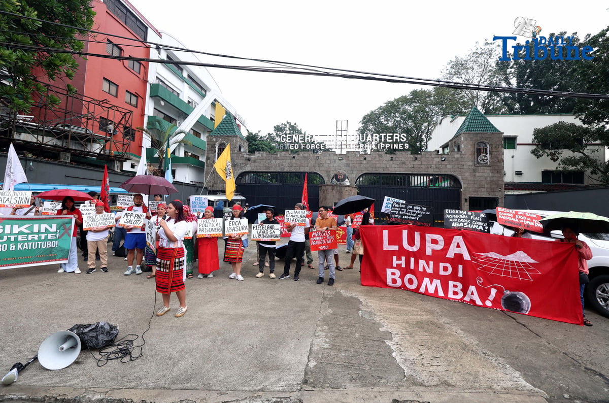Militant and Indigenous groups stage a protest along EDSA outside Camp Aguinaldo in Quezon City on Monday, December 8, 2025, to mark Indigenous Peoples and Moro Human Rights Day. The groups called for action on alleged intensifying human rights violations, corruption scandals, and the funneling of AFP, NTF-ELCAC, and Barangay Development Program funds into militarization and CAFGU operations—amid rising reports of enforced disappearances, killings and political persecution.