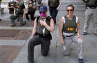 FBI agents fired for kneeling during racial justice protest file suit