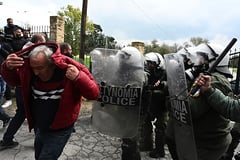 Greek gov’t seeks order after airport clashes