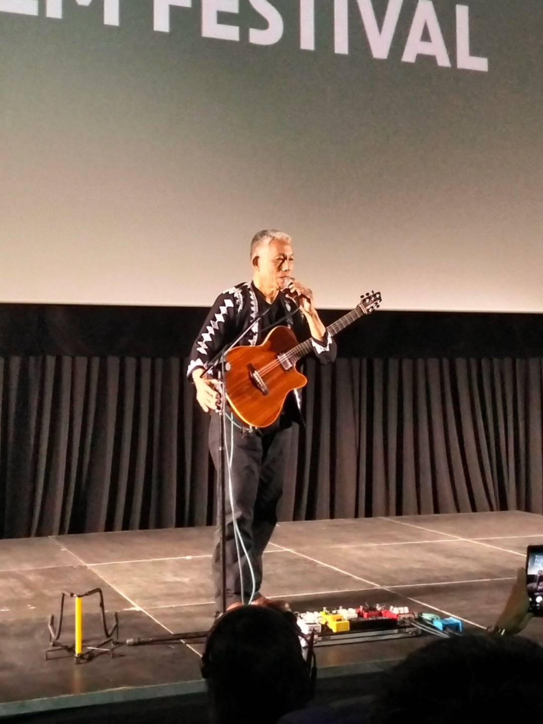 Joey Ayala, special performer for the Know Your North Film Festival Awarding Ceremony, charmed audiences with stories of his own art journey and two original songs.