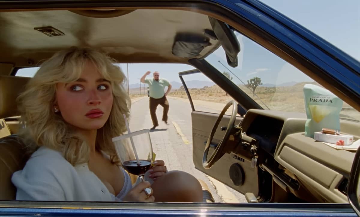 A close-up reveals the meticulous styling and expressive control that define the video’s aesthetic, underscoring Sabrina’s growing command as a visual storyteller. — Youtube/ Sabrina Carpenter