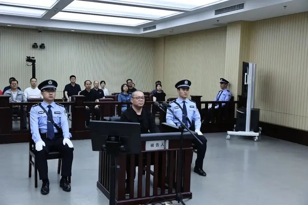 China executes former senior banker for taking $156M bribes