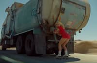 Surrounded by bold production design, Carpenter anchors the visual with a performance that alternates between deadpan comedy and full pop theatrics. — Youtube/ Sabrina Carpenter