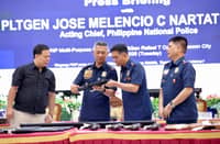 THE Philippine National Police, led by Acting Chief PLtGen. Jose Melencio C. Nartatez Jr. (second from left), accepts the voluntary surrender of 25 high-powered firearms, 70 rounds of ammunition, 15 explosives and four magazine from Jesus P. Martinez of San Pedro Village, Buhangin, Davao City.