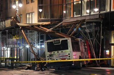 Bus slams into Midtown building, scaffolding collapses
