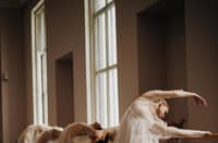 AT the barre.
