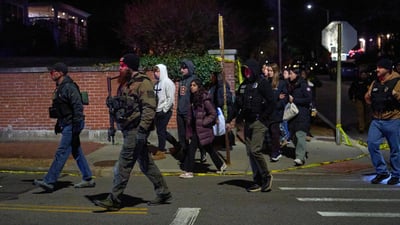 Police hunt gunman who killed two at U.S. university