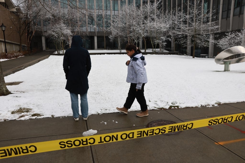 Person of interest in custody after deadly shooting at US university