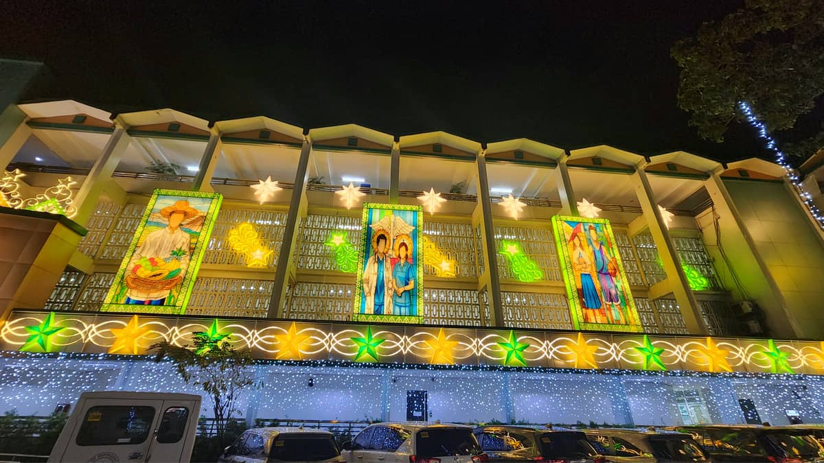 STAINED-GLASS-STYLE lantern panels light up the facade and represent different sectors.
