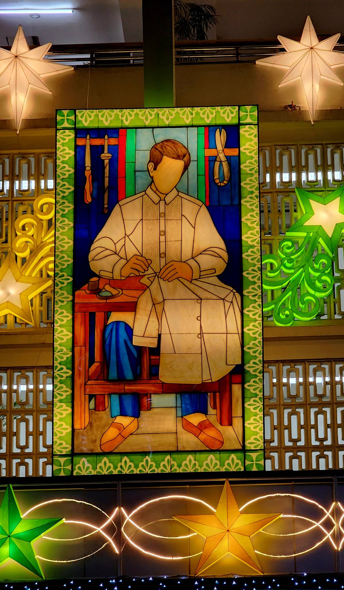 A PANEL depicting embroidery, reminding people that the city was once an embroidery center.