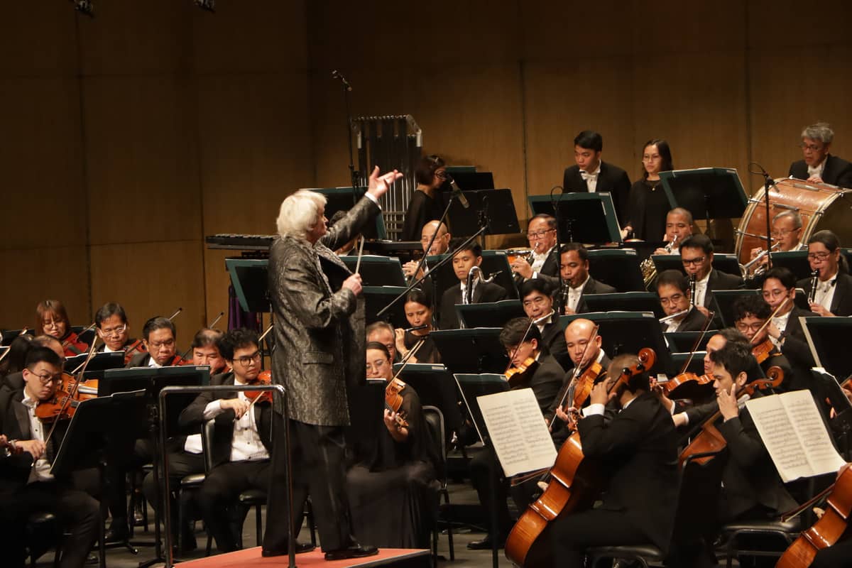 MAESTRO Grzegorz Nowak commands the orchestra.