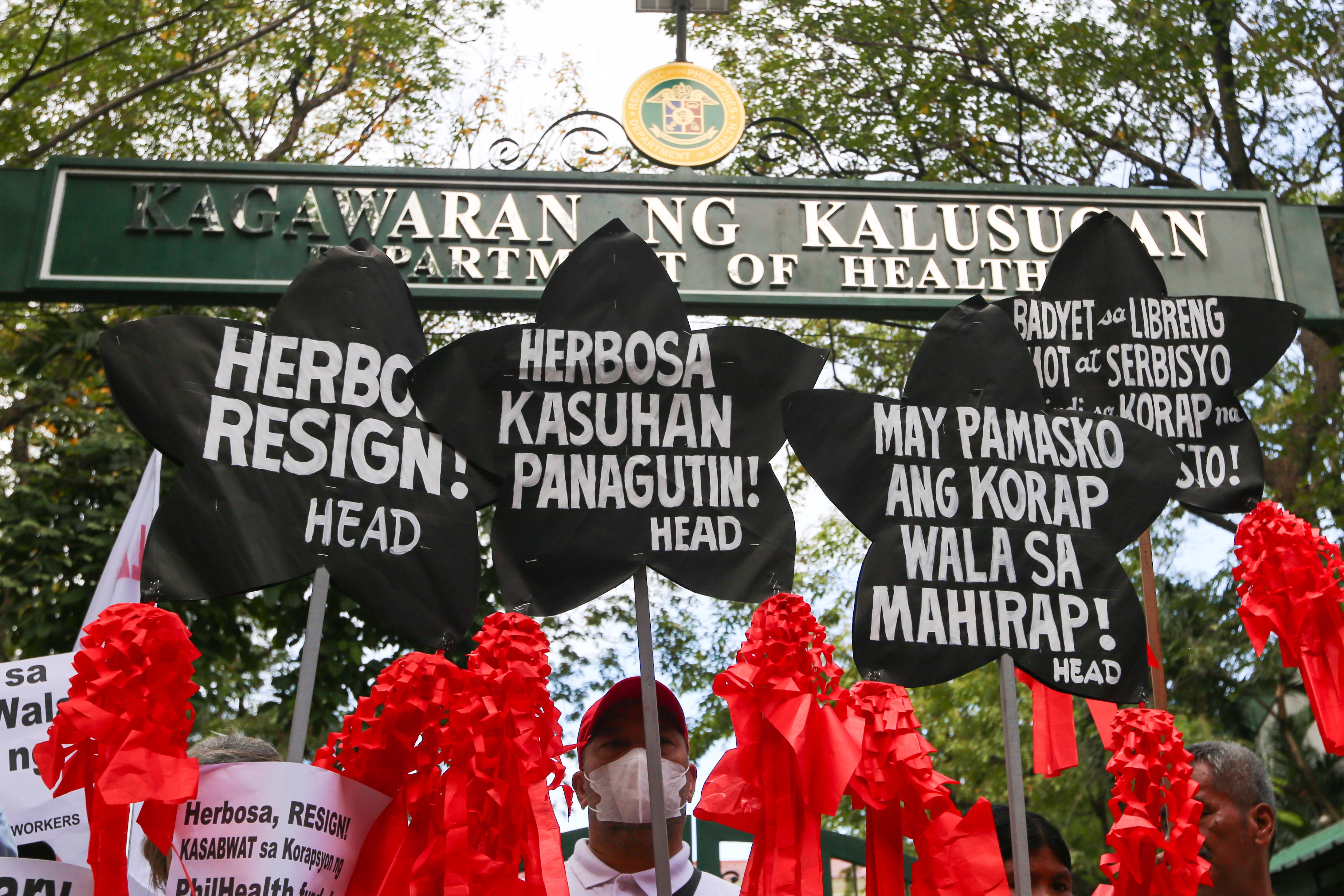 Health advocates stage lantern protest vs DOH chief, PhilHealth fund use