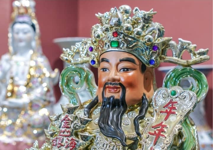 A finely crafted porcelain figure symbolizing prosperity and protection.