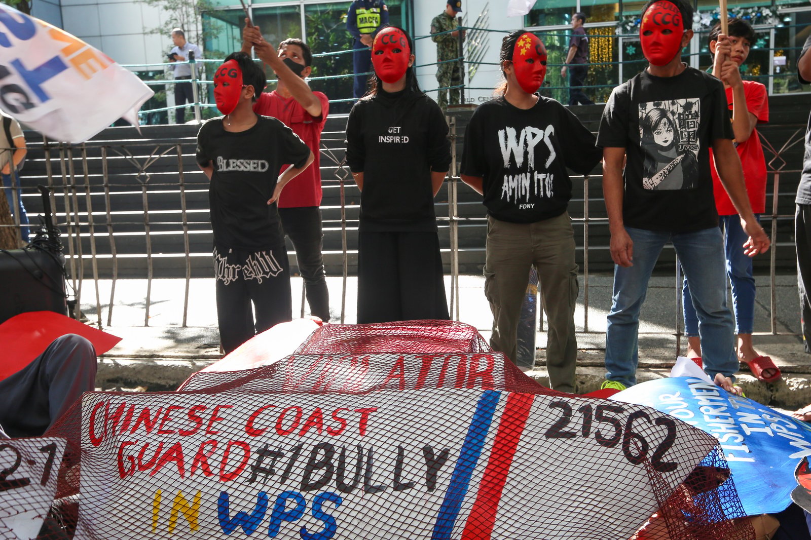 Protesters gather outside the Chinese Consular Office in Makati on 16 December 2025, to condemn the recent violent and dangerous use of water cannons and continued harassment by the Chinese Coast Guard against Filipino fishermen in Escoda Shoal, which is within the Exclusive Economic Zone (EEZ) of the Philippines.