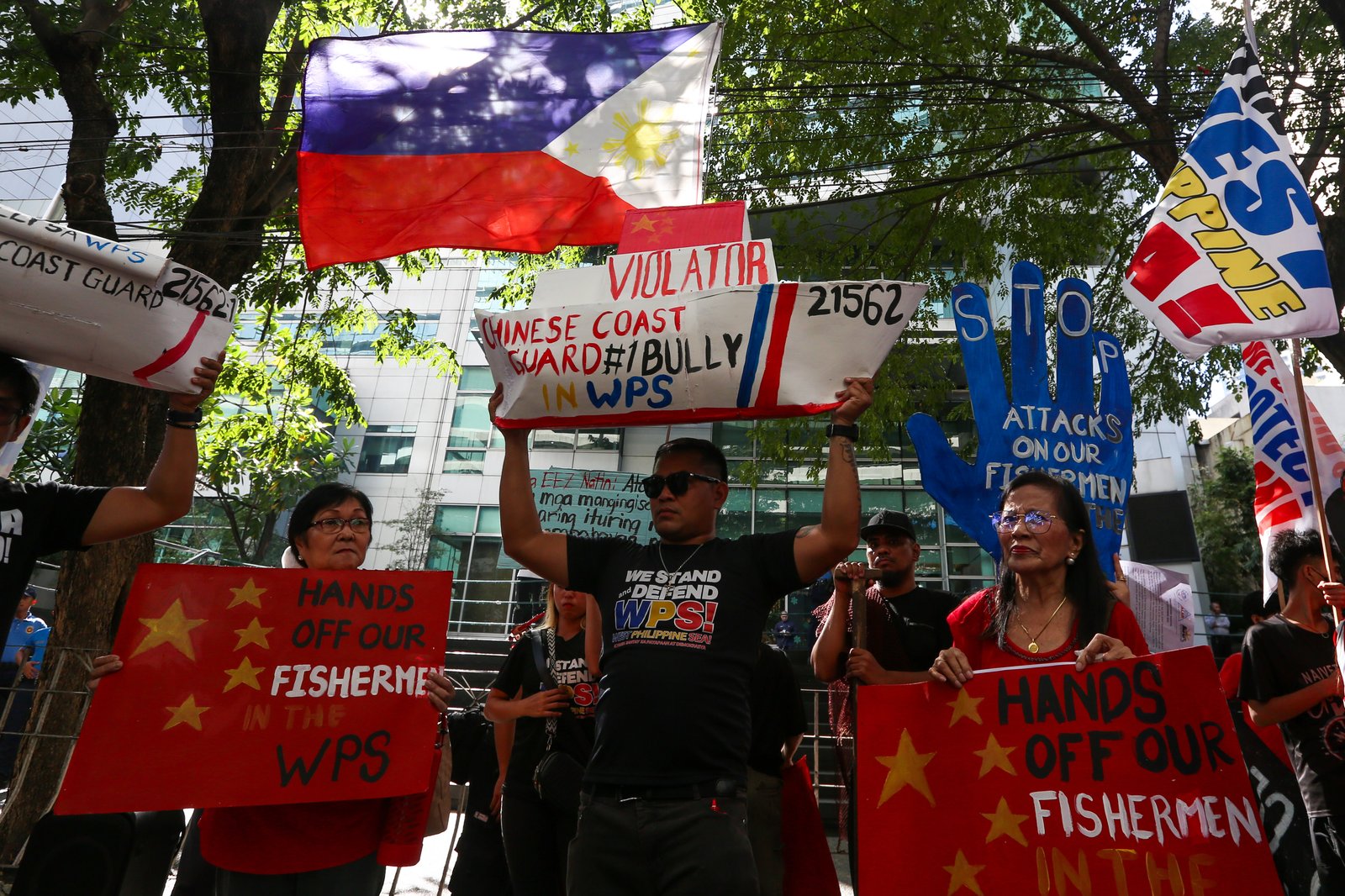 Protesters gather outside the Chinese Consular Office in Makati on 16 December 2025, to condemn the recent violent and dangerous use of water cannons and continued harassment by the Chinese Coast Guard against Filipino fishermen in Escoda Shoal, which is within the Exclusive Economic Zone (EEZ) of the Philippines.