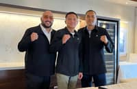 CHARLY Suarez (middle), trainer Delfin Boholst (right) and manager Ric Navalta are keeping their fingers crossed that the WBO rules are in their favor.