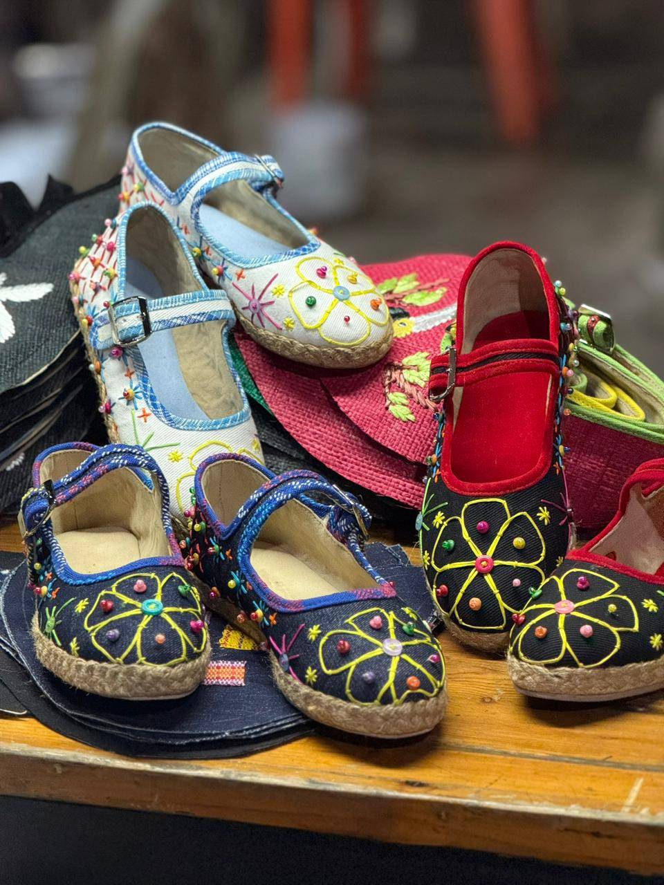 AISHE'S beautifully hand-stitched maryjanes are crafted with care by their talented deaf and nonverbal artisans from Liliw, Laguna.  Each handmade pair is composed  of canvass and yakan fabrication embellished with coconut beads.