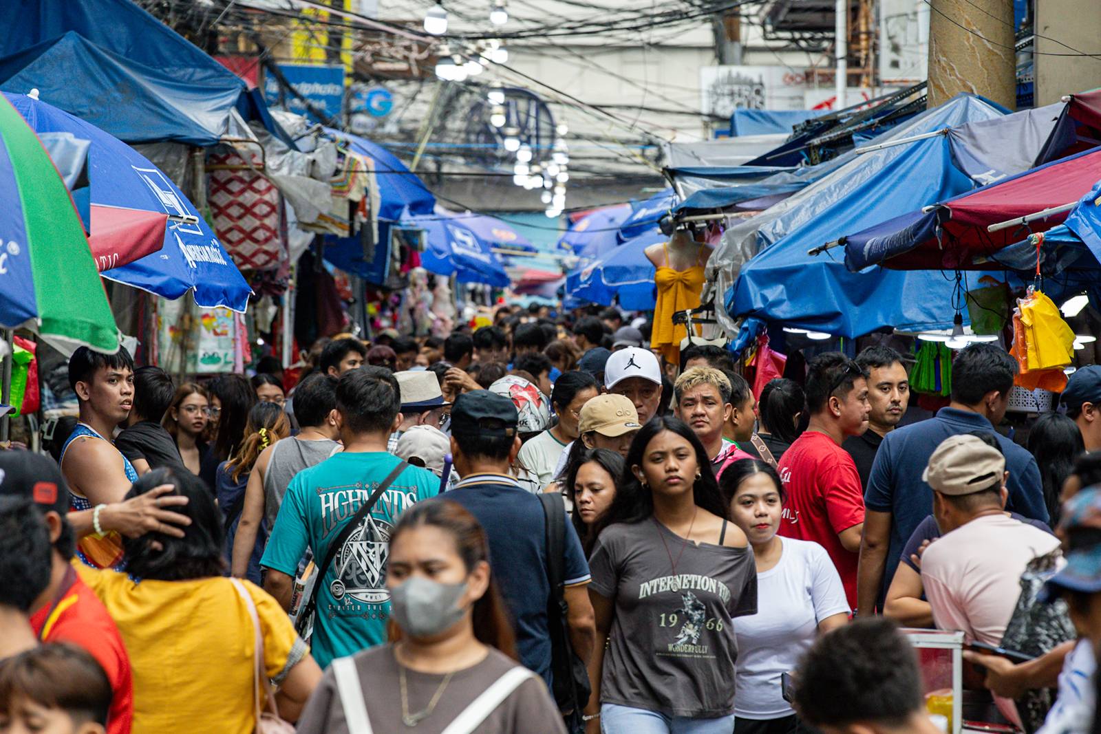 People flock to Quiapo in Manila to buy Christmas gifts on Tuesday, 16 December 2025, nine days before Christmas.
