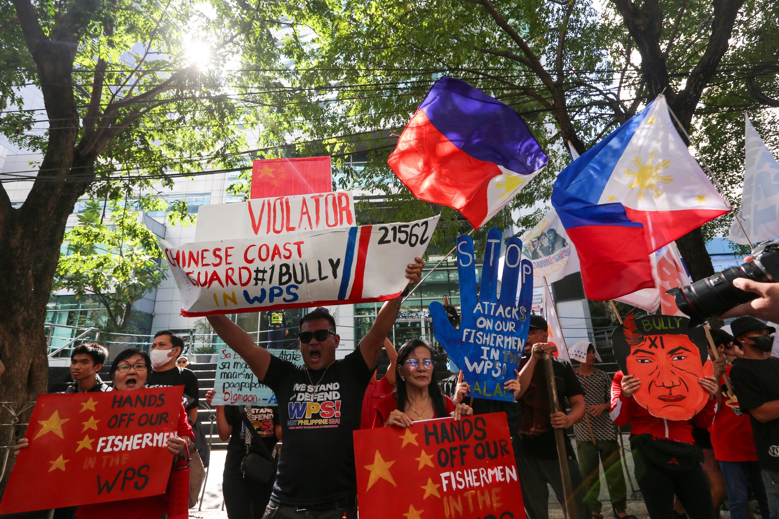 Protesters gather outside the Chinese Consular Office in Makati on 16 December 2025, to condemn the recent violent and dangerous use of water cannons and continued harassment by the Chinese Coast Guard against Filipino fishermen in Escoda Shoal, which is within the Exclusive Economic Zone (EEZ) of the Philippines.