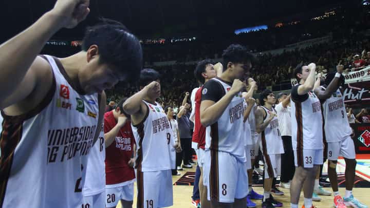 THE UP Fighting Maroons go down fighting against La Salle in their failed bid to retain the UAAP basketball title.
