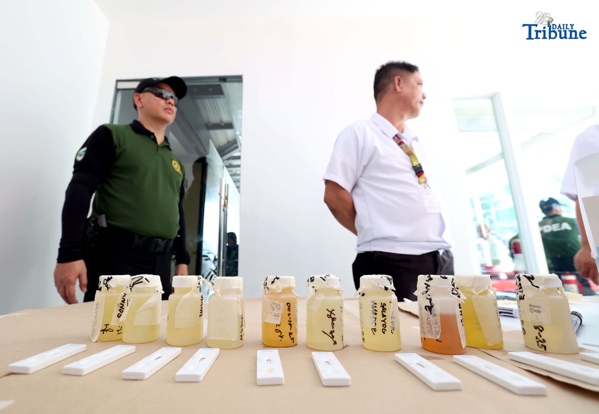 A provincial bus driver undergoes a random drug test conducted by the Philippine Drug Enforcement Agency during a joint inspection of bus terminals by the Metropolitan Manila Development Authority, Department of Transportation, Land Transportation Office, and Land Transportation Franchising and Regulatory Board in Cubao, Quezon City. The inter-agency operation is part of efforts to manage heavy holiday passenger volume and ensure commuter safety.