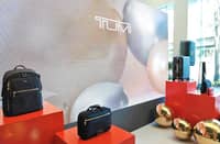TUMI bags displayed during the event, showcasing the brand’s stylish and functional designs perfect for holiday travel.
