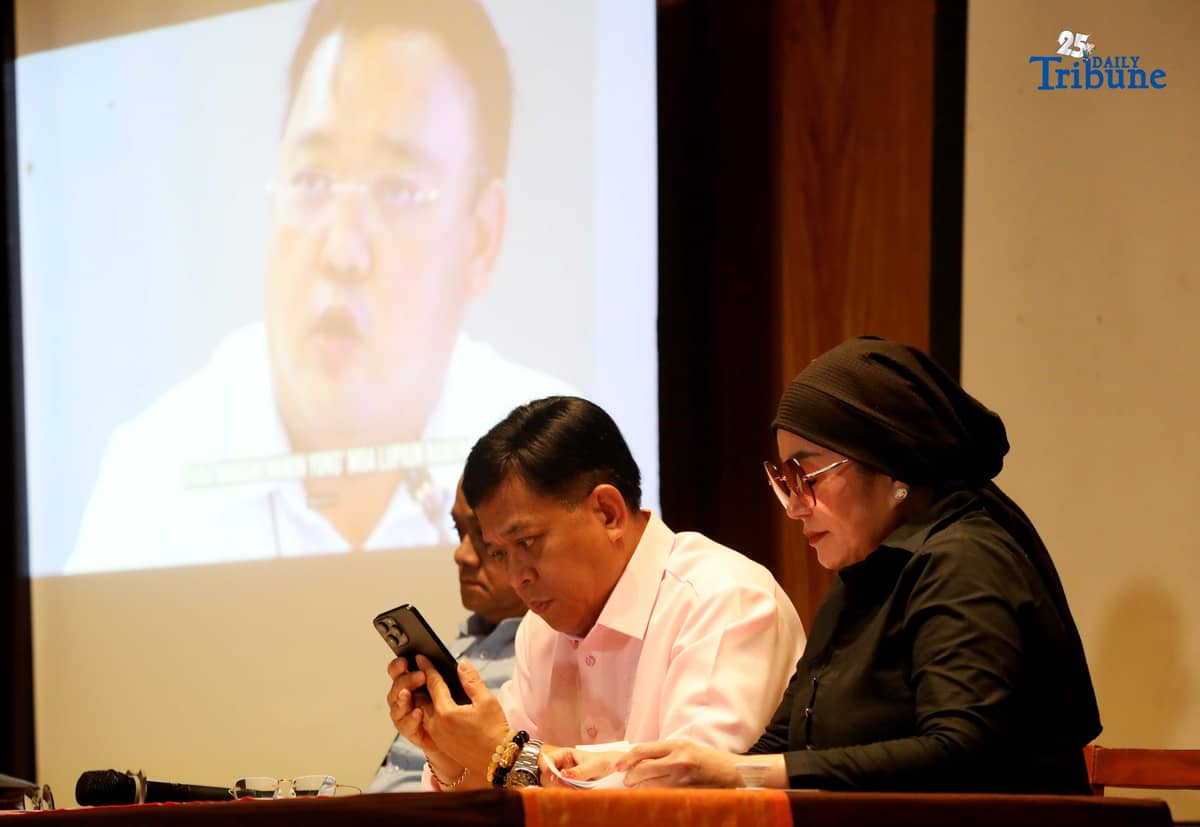 Atty. Raymund Palad, the legal counsel of Ramil Madriaga, and Pyra Lucas from the United Filipino Against Crime and Corruption showed the video to the media regarding the alleged large-scale land grabbing in Bataan linked to former Presidential Spokesperson Harry Roque during a briefing in Quezon City on Thursday, 18 December 2025.