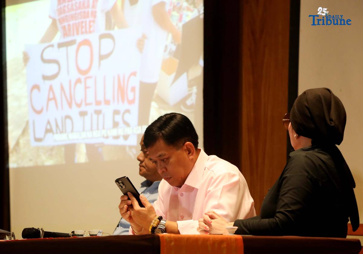 Atty. Raymund Palad, the legal counsel of Ramil Madriaga, and Pyra Lucas from the United Filipino Against Crime and Corruption showed the video to the media regarding the alleged large-scale land grabbing in Bataan linked to former Presidential Spokesperson Harry Roque during a briefing in Quezon City on Thursday, 18 December 2025.