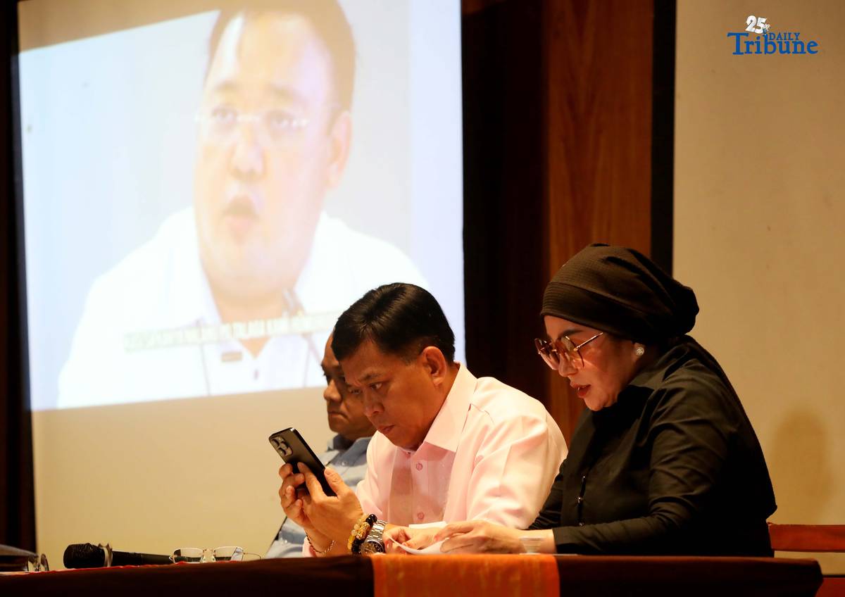 Atty. Raymund Palad, the legal counsel of Ramil Madriaga, and Pyra Lucas from the United Filipino Against Crime and Corruption showed the video to the media regarding the alleged large-scale land grabbing in Bataan linked to former Presidential Spokesperson Harry Roque during a briefing in Quezon City on Thursday, 18 December 2025.