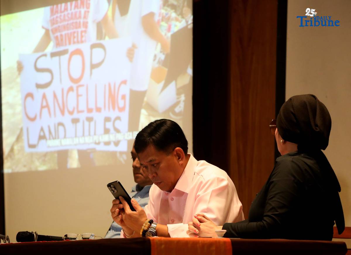Atty. Raymund Palad, the legal counsel of Ramil Madriaga, and Pyra Lucas from the United Filipino Against Crime and Corruption showed the video to the media regarding the alleged large-scale land grabbing in Bataan linked to former Presidential Spokesperson Harry Roque during a briefing in Quezon City on Thursday, 18 December 2025.