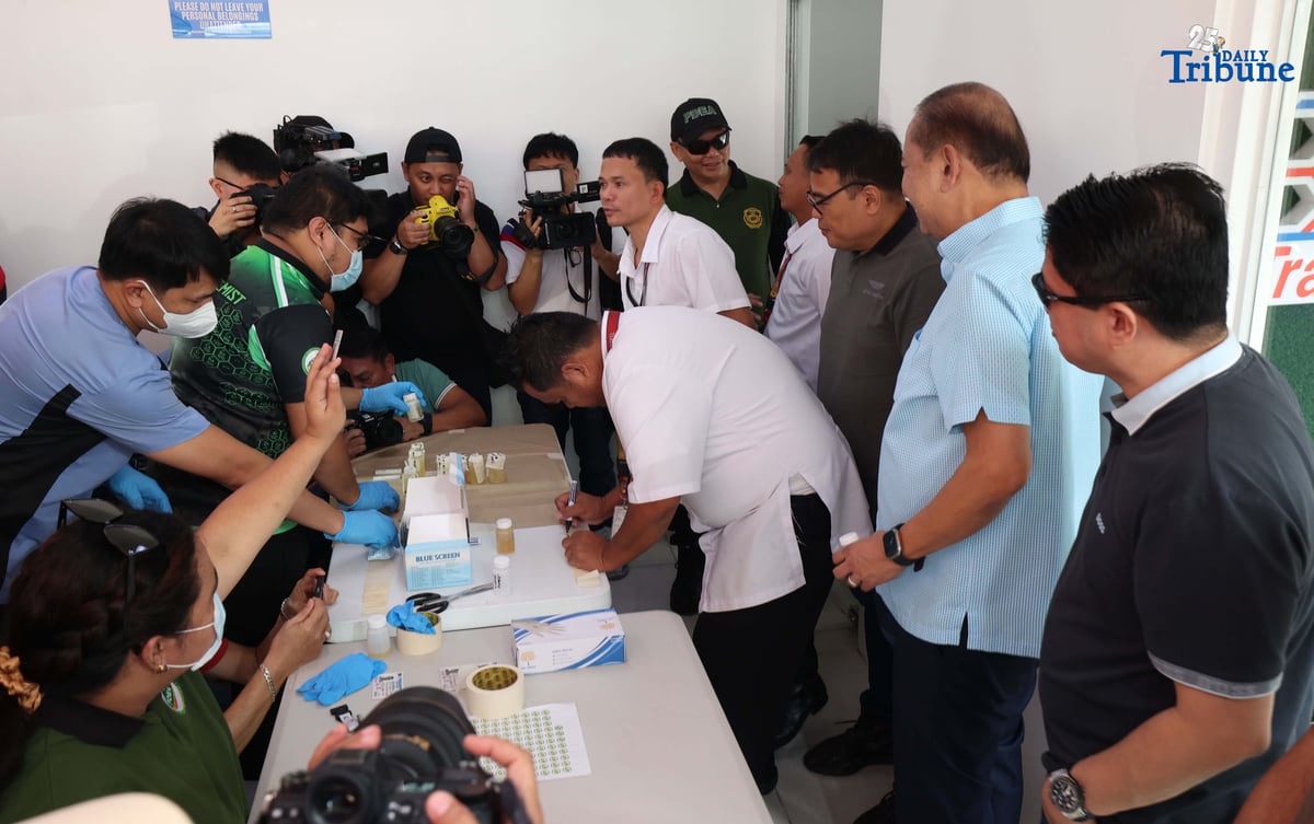 A provincial bus driver undergoes a random drug test conducted by the Philippine Drug Enforcement Agency during a joint inspection of bus terminals by the Metropolitan Manila Development Authority, Department of Transportation, Land Transportation Office, and Land Transportation Franchising and Regulatory Board in Cubao, Quezon City. The inter-agency operation is part of efforts to manage heavy holiday passenger volume and ensure commuter safety.