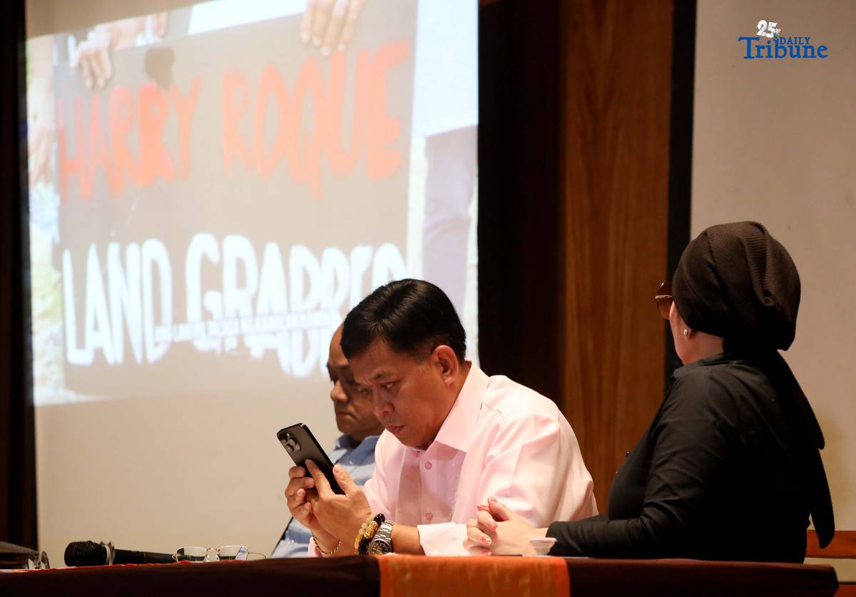 Atty. Raymund Palad, the legal counsel of Ramil Madriaga, and Pyra Lucas from the United Filipino Against Crime and Corruption showed the video to the media regarding the alleged large-scale land grabbing in Bataan linked to former Presidential Spokesperson Harry Roque during a briefing in Quezon City on Thursday, 18 December 2025.