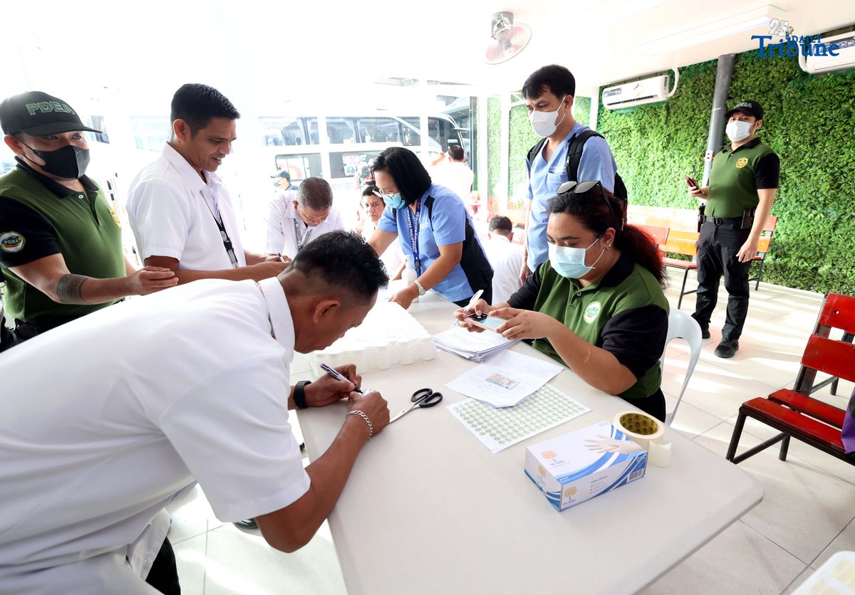 A provincial bus driver undergoes a random drug test conducted by the Philippine Drug Enforcement Agency during a joint inspection of bus terminals by the Metropolitan Manila Development Authority, Department of Transportation, Land Transportation Office, and Land Transportation Franchising and Regulatory Board in Cubao, Quezon City. The inter-agency operation is part of efforts to manage heavy holiday passenger volume and ensure commuter safety.