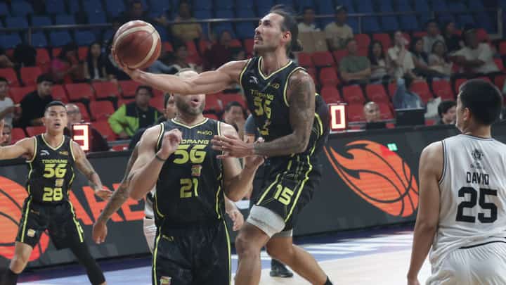 JORDAN Heading of TNT soars for a layup during their PBA Philippine Cup game against Blackwater on Friday. The Tropang 5G prevailed, 113-96.
