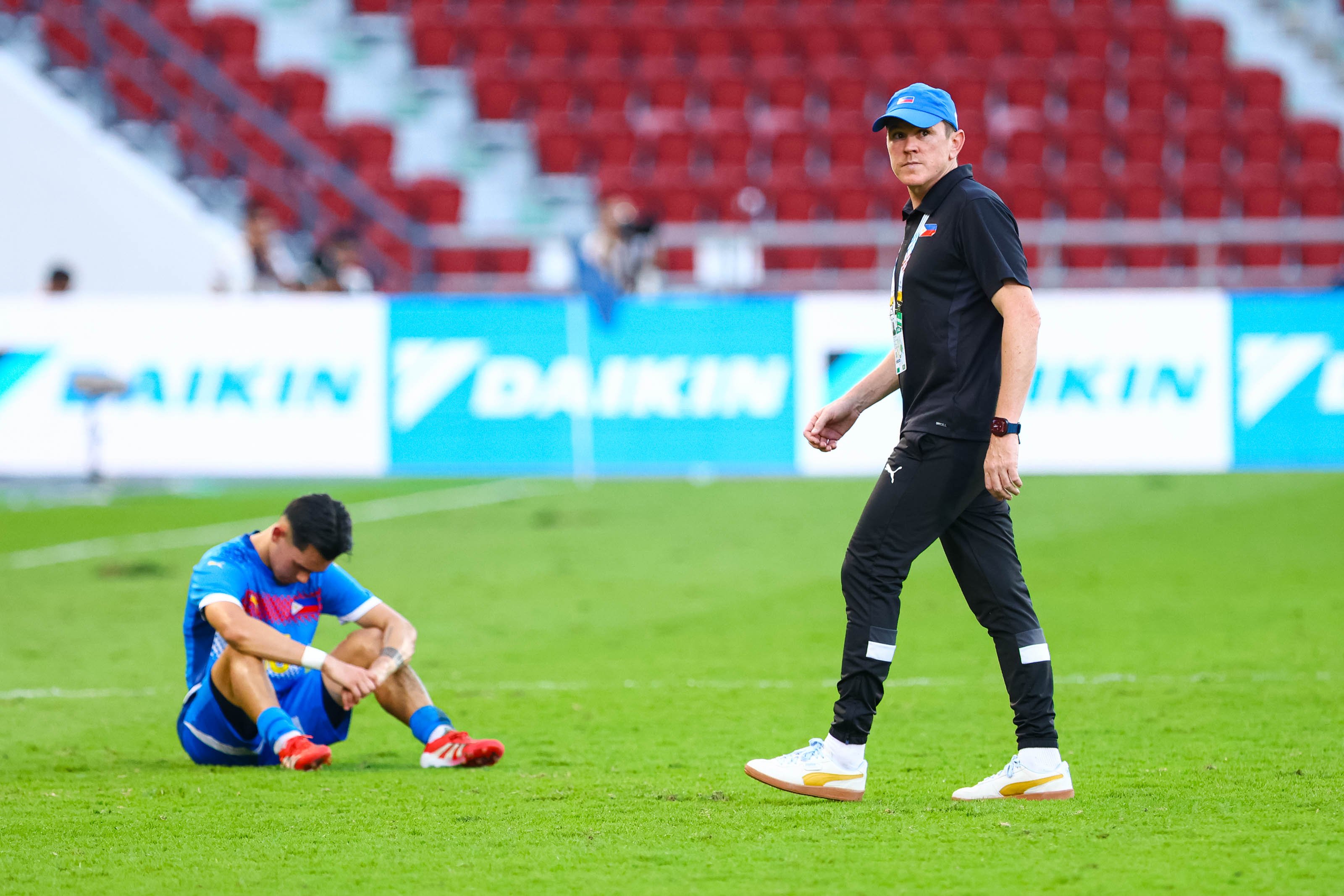 COACH Garrath McPherson (right), Alex Monis (left) and the national men’s U22 football team will be going home empty-handed following a disappointing finish in the 33rd Southeast Asian Games.