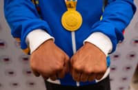 EUMIR Marcial's hands that gave him his fifth Southeast Asian Games gold medal in his bout, even though strings of storms came to challenge him.