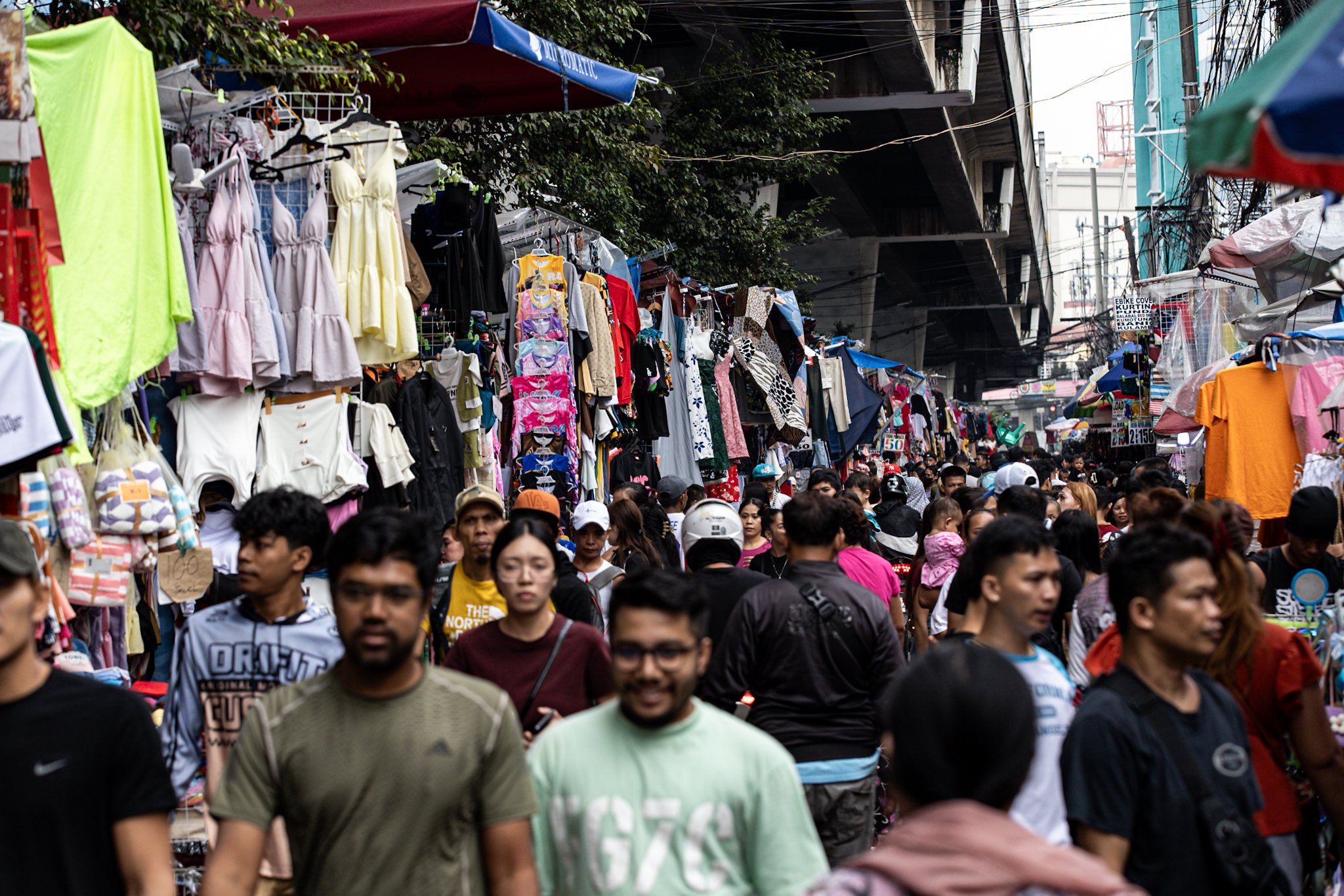Shoppers buy Christmas gifts at Baclaran Market