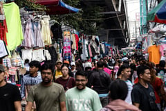 Shoppers buy Christmas gifts at Baclaran Market