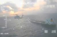 A UNITED States Coast Guard aircraft fly over a crude oil tanker, last docked in Venezuela, before apprehending it on 20 December 2025.