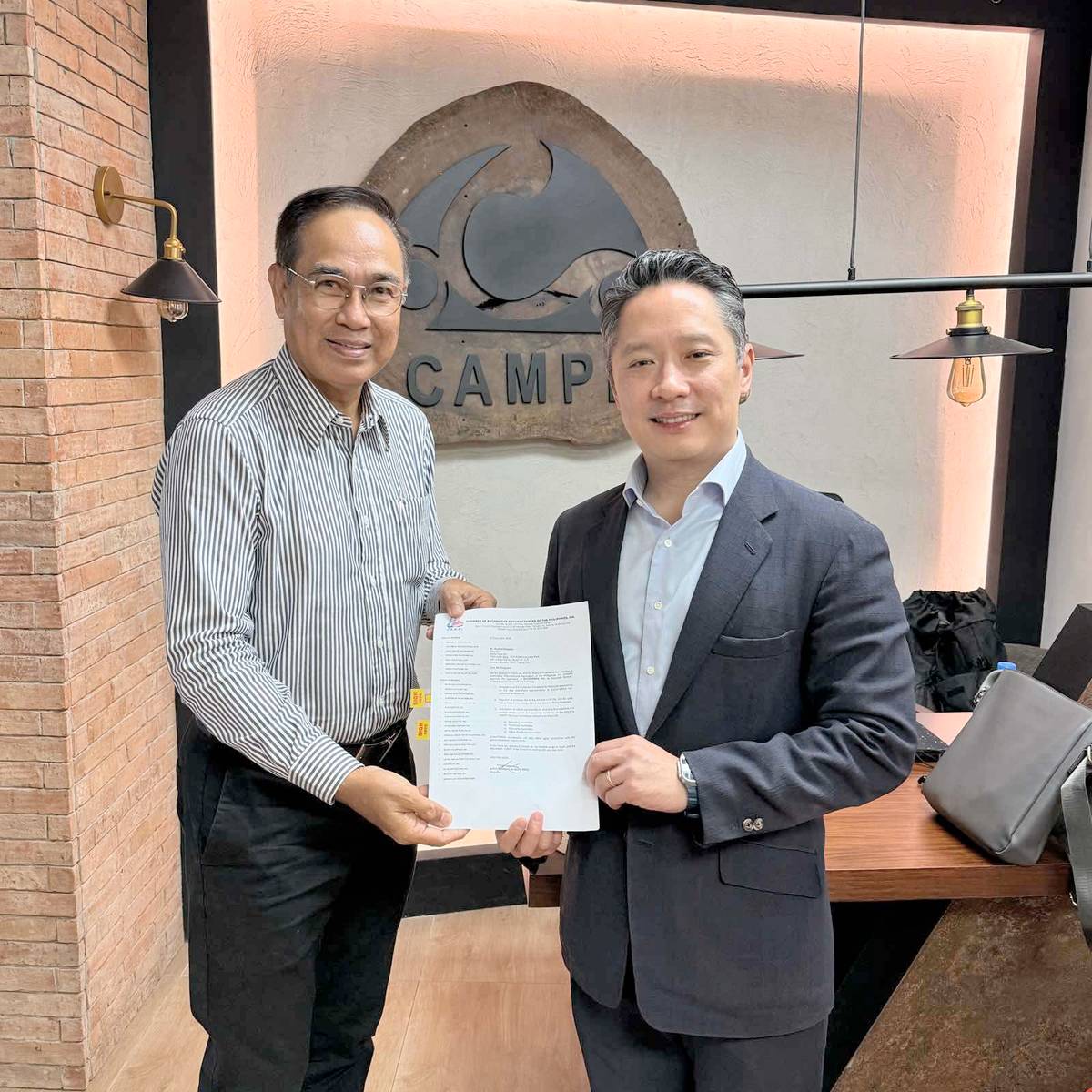 RASHID Delgado, president of EVOxTerra and TDG Group Co-CEO, together with Chamber of Automotive Manufacturers of the Philippines Inc. president Atty. Rommel R. Gutierrez, on Hongqi Philippines’ entry into the country’s premier automotive association.