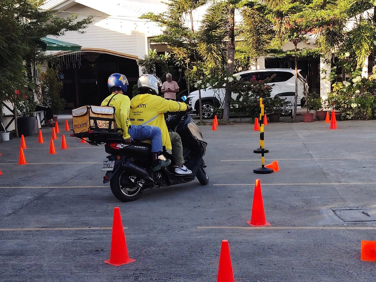 DRIVER-PARTNERS demonstrate safe riding practices during the hands-on practical session.