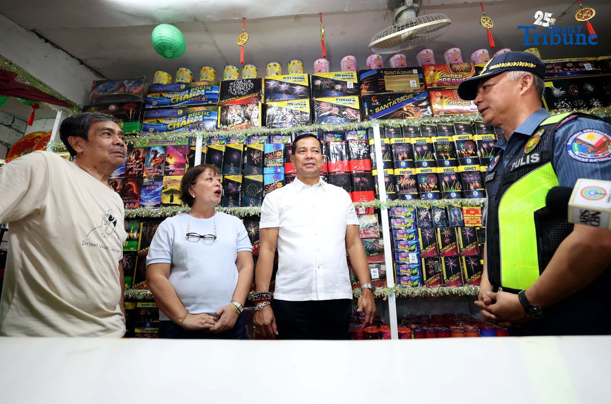 (December 22 2025) Acting PNP Chief PLt. Gen. Jose Melencio Nartatez Jr. with Bulacan Governor Daniel R. Fernando show the legal kinds of firecrackers during the ocular join inspection at fireworks shops at Bocaue, Bulacan a fireworks capital of the Philippines on Monday, December 22, 2025. Photo/Analy Labor