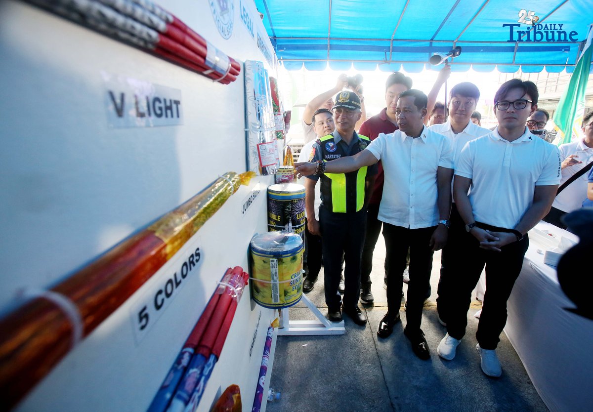 (December 22 2025) Acting PNP Chief PLt. Gen. Jose Melencio Nartatez Jr. with Bulacan Governor Daniel R. Fernando show the legal kinds of firecrackers during the ocular join inspection at fireworks shops at Bocaue, Bulacan a fireworks capital of the Philippines on Monday, December 22, 2025. Photo/Analy Labor