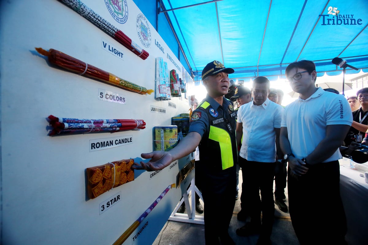 (December 22 2025) Acting PNP Chief PLt. Gen. Jose Melencio Nartatez Jr. with Bulacan Governor Daniel R. Fernando show the legal kinds of firecrackers during the ocular join inspection at fireworks shops at Bocaue, Bulacan a fireworks capital of the Philippines on Monday, December 22, 2025. Photo/Analy Labor